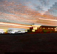 Bus Transfer Alice Springs to Ayers Rock Resort - Winery Find