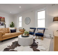 Large stylish and quiet penthouse steps from surf - Winery Find