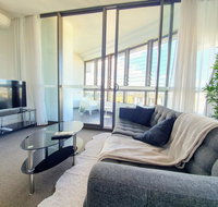 Luxury Level 2-bed 2-bath City View Apt in Olympic Park - Winery Find