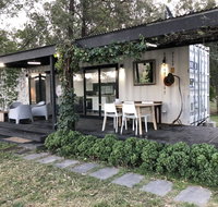 Absolute riverfront shipping container cabin - Winery Find